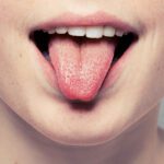 Alitosi e Bocca Amara: Cause, Rimedi e Trattamenti